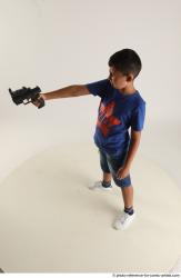 TIMBO STANDING POSE WITH GUN